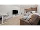 Comfortable living space with a work space desk that flows into a modern kitchen at 13208 Leggett Aly, Orlando, FL 32827