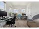 Bright office space featuring multiple work stations, natural light, and comfortable seating at 13208 Leggett Aly, Orlando, FL 32827