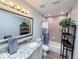Bathroom featuring single vanity with granite counters and tub with shower at 1326 Wildcat Ct, Apopka, FL 32712