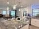 Well-lit kitchen features updated countertops, modern appliances, and convenient access to the dining area at 1326 Wildcat Ct, Apopka, FL 32712