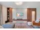 Stylish living room features a custom media center, recessed lighting, and neutral tones at 14189 Larkspur Lake Dr, Winter Garden, FL 34787