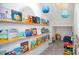 Charming reading nook filled with bookshelves and colorful decor, creating a cozy space at 14189 Larkspur Lake Dr, Winter Garden, FL 34787