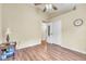 Bedroom features wood-look floors, ample lighting, and access to other rooms of the home at 14654 Lady Victoria Blvd, Orlando, FL 32826
