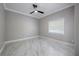 Simple bedroom featuring marble floors and light-colored walls and trim at 1706 Cheltenborough Dr, Orlando, FL 32835