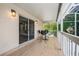 Screened patio with tile floors and outdoor seating, perfect for relaxing at 1706 Cheltenborough Dr, Orlando, FL 32835