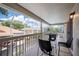 Inviting screened patio with comfortable seating and neighborhood views at 1706 Cheltenborough Dr, Orlando, FL 32835