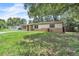 Charming single-story house with a well-manicured lawn, ready for new memories at 1711 37Th St, Orlando, FL 32839