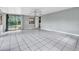 Living room with tile flooring, large sliding door, and lots of natural light at 1711 37Th St, Orlando, FL 32839