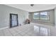 Light-filled living room with tile floors and natural light at 1711 37Th St, Orlando, FL 32839