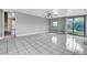 Large room with tile flooring, great natural light, and glass sliding door at 1711 37Th St, Orlando, FL 32839