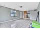 Bright living room with tile flooring and plenty of natural light at 1711 37Th St, Orlando, FL 32839