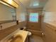 A full bathroom featuring tile detail around tub/shower combo and vanity at 1730 Oneco Ave, Winter Park, FL 32789