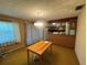 Dining area and eat-in kitchen featuring retro decor, updated appliances and natural lighting at 1730 Oneco Ave, Winter Park, FL 32789