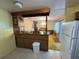 An eat-in kitchen and dining area featuring custom wood cabinets at 1730 Oneco Ave, Winter Park, FL 32789