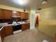An eat-in kitchen area with vintage cabinets, updated appliances and neutral walls at 1730 Oneco Ave, Winter Park, FL 32789
