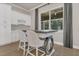 Cozy breakfast nook features a built-in buffet and a large window with outside view at 1938 Filly Trl, Oviedo, FL 32765