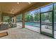 Covered lanai overlooking a private pool, with comfortable seating and ample space for relaxation at 1938 Filly Trl, Oviedo, FL 32765