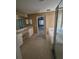 Bathroom featuring double vanity, soaking tub, walk-in shower, and doorway to the bedroom at 2020 Rushden Dr, Ocoee, FL 34761