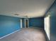 Large bedroom with neutral walls, ceiling fan, window, and ample natural light at 2020 Rushden Dr, Ocoee, FL 34761