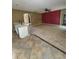 Open concept living room featuring tile flooring and abundant natural light at 2020 Rushden Dr, Ocoee, FL 34761