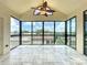 Spacious balcony with tile flooring and large windows providing abundant natural light and beautiful views at 204 Quayside Cir # 601, Maitland, FL 32751