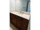 Bathroom with a vanity cabinet with granite countertop, sink and a large mirror at 204 Quayside Cir # 601, Maitland, FL 32751