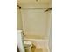 Bathroom with tiled shower-tub combo and toilet with white tiling at 204 Quayside Cir # 601, Maitland, FL 32751