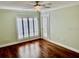 Bedroom with ceiling fan, and shuttered windows at 204 Quayside Cir # 601, Maitland, FL 32751