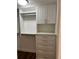Well-organized closet with drawers and shelves at 204 Quayside Cir # 601, Maitland, FL 32751