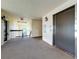 Clean condo hallway featuring carpet, an elevator, and well-lit access to each unit at 204 Quayside Cir # 601, Maitland, FL 32751
