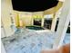 Relaxing hot tub under a covered area, with lounge chair and tiled floor at 204 Quayside Cir # 601, Maitland, FL 32751