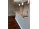 Kitchen bar and pantry area with hard wood floors at 204 Quayside Cir # 601, Maitland, FL 32751