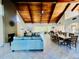 Spacious living room featuring wood ceiling, tile floor, and ample seating at 204 Quayside Cir # 601, Maitland, FL 32751