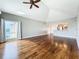 Spacious living room boasting hardwood floors and a window view to the water at 204 Quayside Cir # 601, Maitland, FL 32751