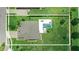 Aerial view of house with large backyard, swimming pool, and outdoor seating area at 2118 Whiting Trl, Orlando, FL 32820