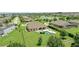 Aerial view of a well-manicured backyard, outdoor furniture, and an in-ground pool at 2118 Whiting Trl, Orlando, FL 32820