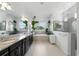 Large bathroom with double vanity, soaking tub, and walk-in shower at 2118 Whiting Trl, Orlando, FL 32820