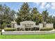 The 'Lake Pickett Reserve' entrance sign framed by manicured greenery creates an inviting neighborhood welcome at 2118 Whiting Trl, Orlando, FL 32820