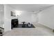 A home gym offers a sleek workout area with exercise equipment and ample space for training at 2118 Whiting Trl, Orlando, FL 32820