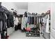 Walk-in closet with shelving and ample storage space for clothes and accessories at 2118 Whiting Trl, Orlando, FL 32820