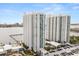 Gorgeous aerial view of multiple towers, a marina and landscaping around a parking garage at 241 Riverside Dr # 902, Holly Hill, FL 32117
