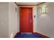 Apartment front door with gray walls and decorative carpet at 241 Riverside Dr # 902, Holly Hill, FL 32117