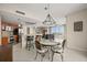 Open floor plan showcases the kitchen, dining area, and living room, perfect for entertaining and waterfront views at 241 Riverside Dr # 902, Holly Hill, FL 32117