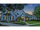 Charming home with beautiful landscaping, pathway, and exterior lighting at 2523 Madron Ct, Orlando, FL 32806