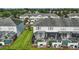 Backyards featuring screened in patios with in-ground pools and green grass at 2531 Maneshaw Ln, Kissimmee, FL 34747