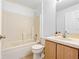 Bathroom featuring a shower-tub combination, vanity with sink, and neutral finishes at 2741 Beaver Dr, Deltona, FL 32725