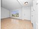 Bright living room with a large window providing ample natural light and tile flooring at 2741 Beaver Dr, Deltona, FL 32725