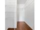 Spacious walk-in closet with wire shelving and hardwood floors, providing ample storage space at 2741 Beaver Dr, Deltona, FL 32725