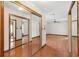 Hardwood floors and mirrored closet doors add appeal and spaciousness to this bedroom at 2809 Gulf Winds Ct, Oviedo, FL 32765