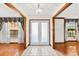 Bright foyer with tiled floors and glass paneled front doors at 2809 Gulf Winds Ct, Oviedo, FL 32765